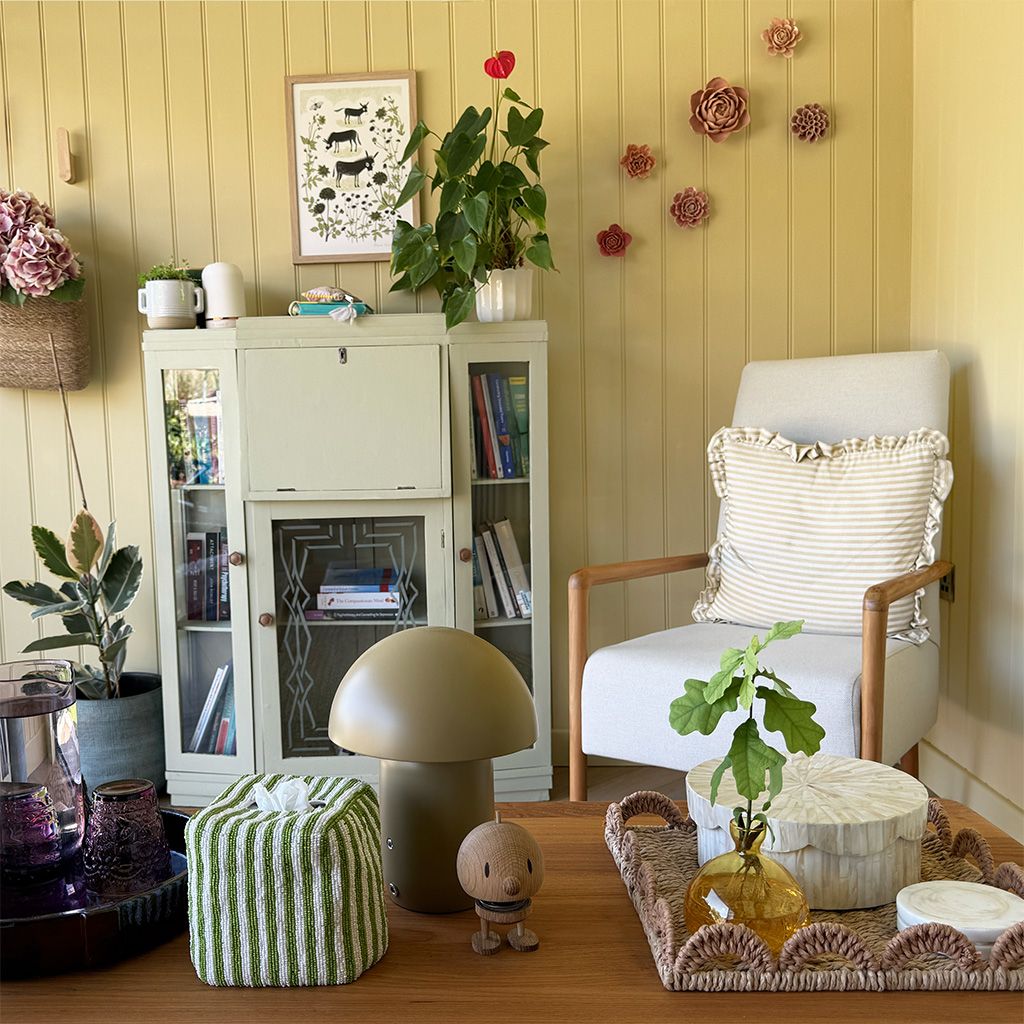 A view of a therapist's armchair in a light wood panelled room